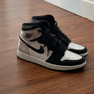 Air Jordan 1 Black and White High-Top Sneakers