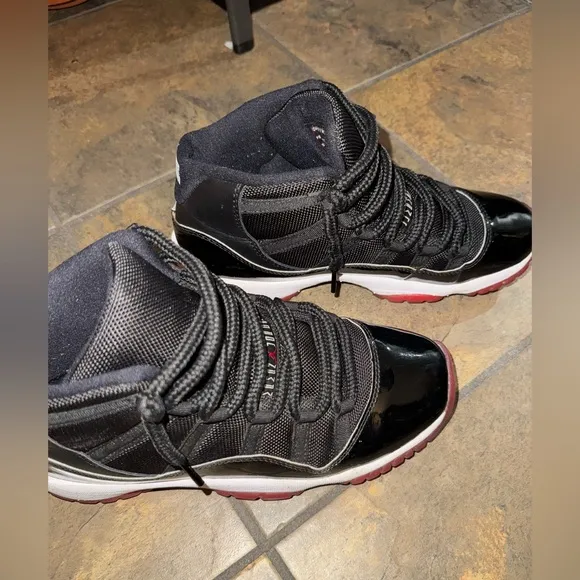 Air Jordan 11 Retro Black, White, Red High-Top Sneakers. Sz 7 youth.