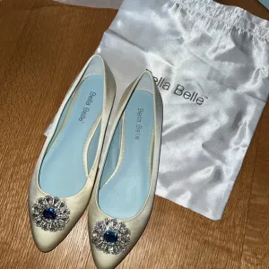 Bella Belle white pointed flats with silver and blue stones
