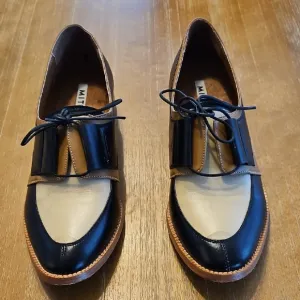 Blue and Tan Flats with Sleek Design