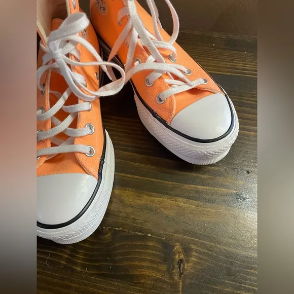 Converse Chuck Taylor All Star Lift Women’s Platform Orange High-Top Sneakers