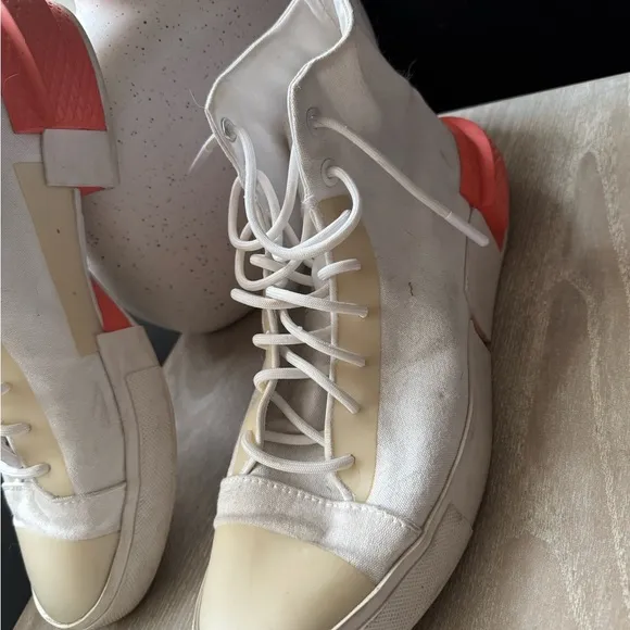 Converse White and Orange High-Top Sneakers Modern Design