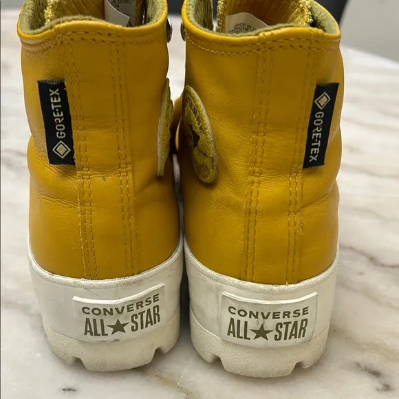 Converse Yellow High-Top Platforms