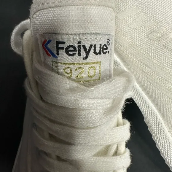 Feiyue White High-Top Sneakers size 11 pre owned Exellent condition.