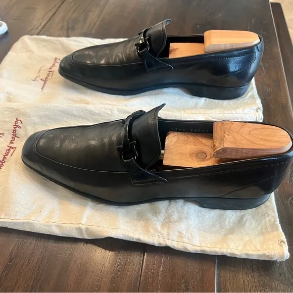 Ferragamo black leather dress shoes w/ iconic buckle.