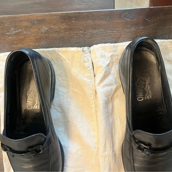 Ferragamo black leather dress shoes w/ iconic buckle.