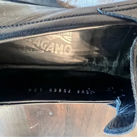 Ferragamo black leather dress shoes w/ iconic buckle.