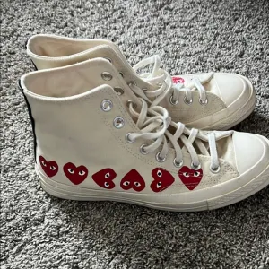 High-Top Sneakers with Red Heart Design