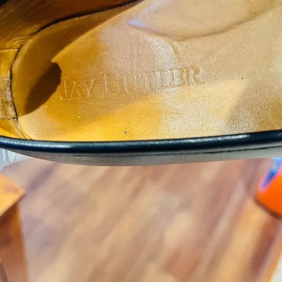Jay Butler’s Brown Horse Bit Leather Loafers with Gold Detailing.