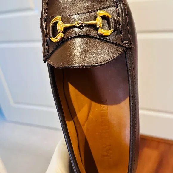 Jay Butler’s Brown Horse Bit Leather Loafers with Gold Detailing.