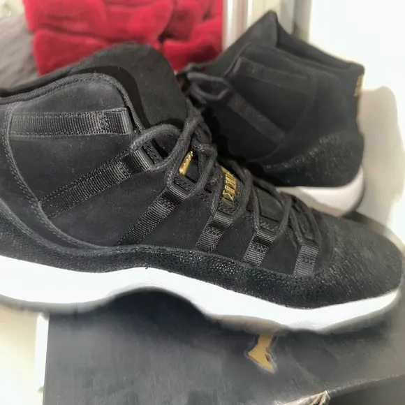 Jordan Black and Gold Sneakers with Iconic High-Top Design