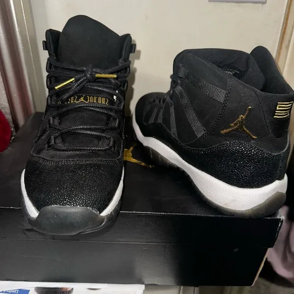 Jordan Black and Gold Sneakers with Iconic High-Top Design