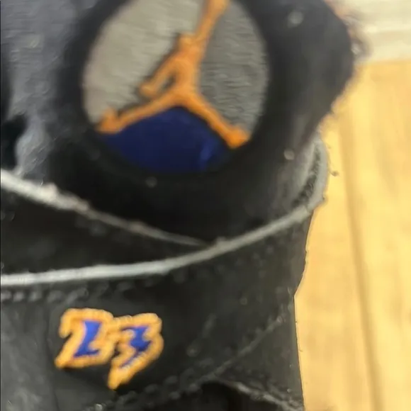 Jordan Black and Orange Retro Sneakers