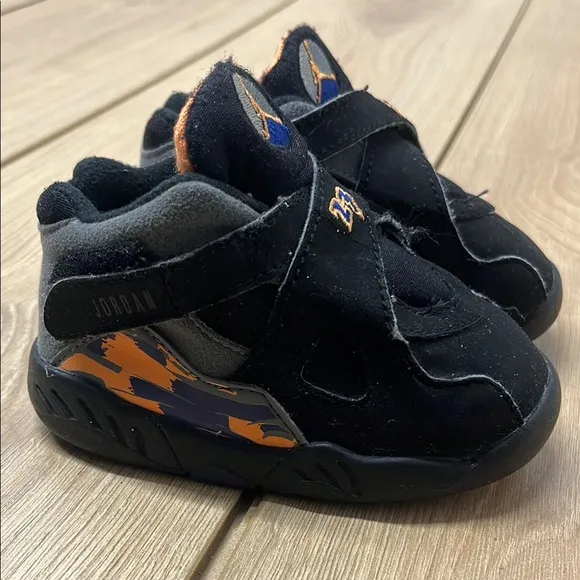Jordan Black and Orange Retro Sneakers