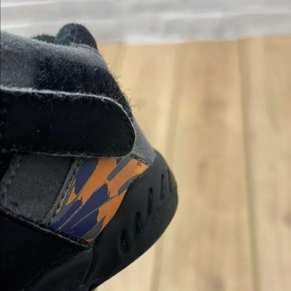 Jordan Black and Orange Retro Sneakers