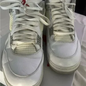 Jordan White and Red High-Top Sneakers with Retro Design