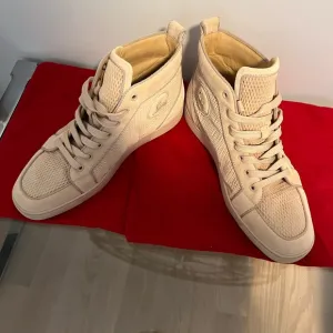 Never worn, Christian Louboutin high top sneakers. Men’s size 42.5.