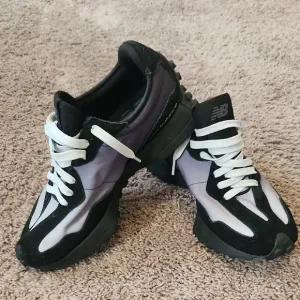 New Balance Black and White Athletic Sneakers with Chunky Sole