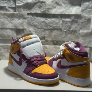 Nike Air Jordan 1 Mid Purple and Yellow Sneakers