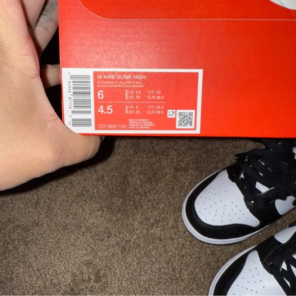 Nike womens Black and White High-Top Sneakers