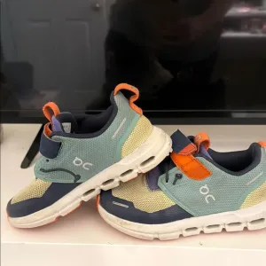 On Running Blue and Orange Sneakers Sporty Aesthetic