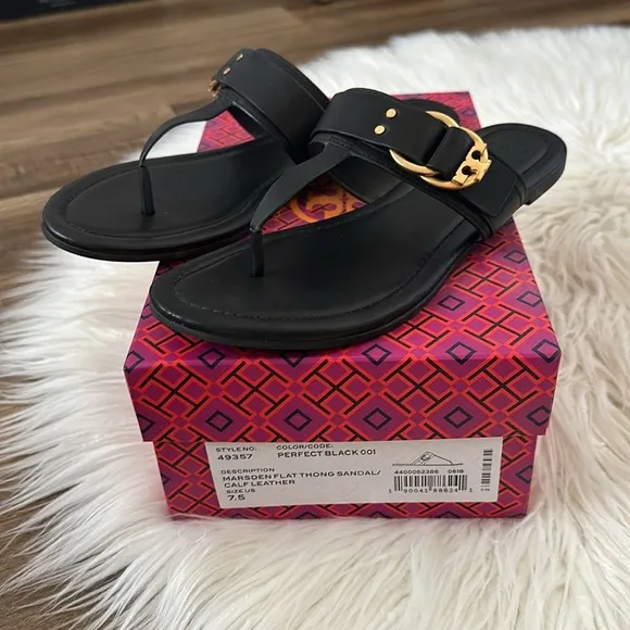 Tory Burch • Black and Gold flat sandals
