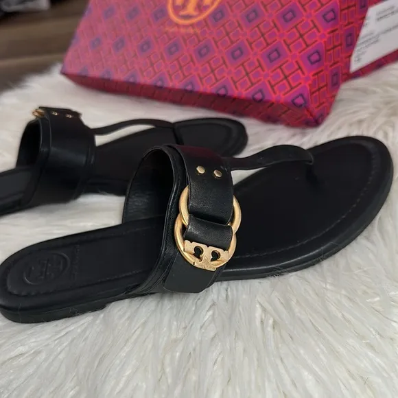 Tory Burch • Black and Gold flat sandals
