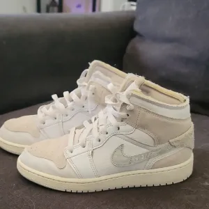 White and Beige Nike Jordans