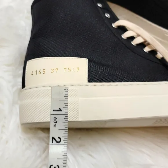 Woman by Common Projects | Tournament High Top Sneakers