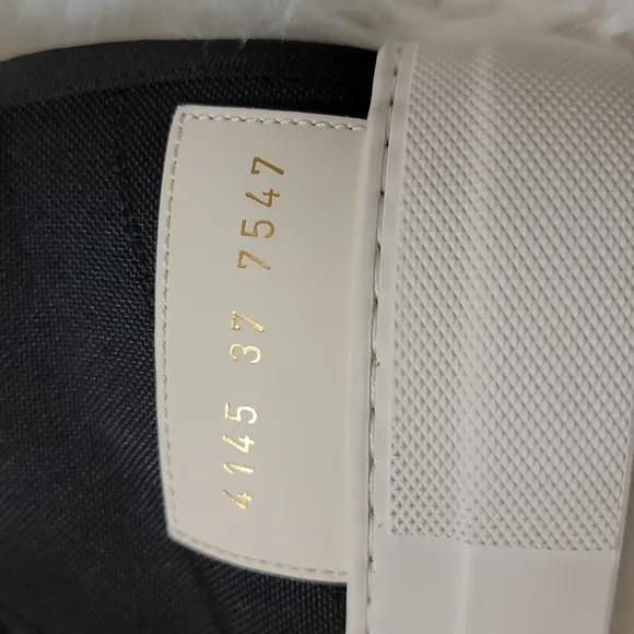 Woman by Common Projects | Tournament High Top Sneakers